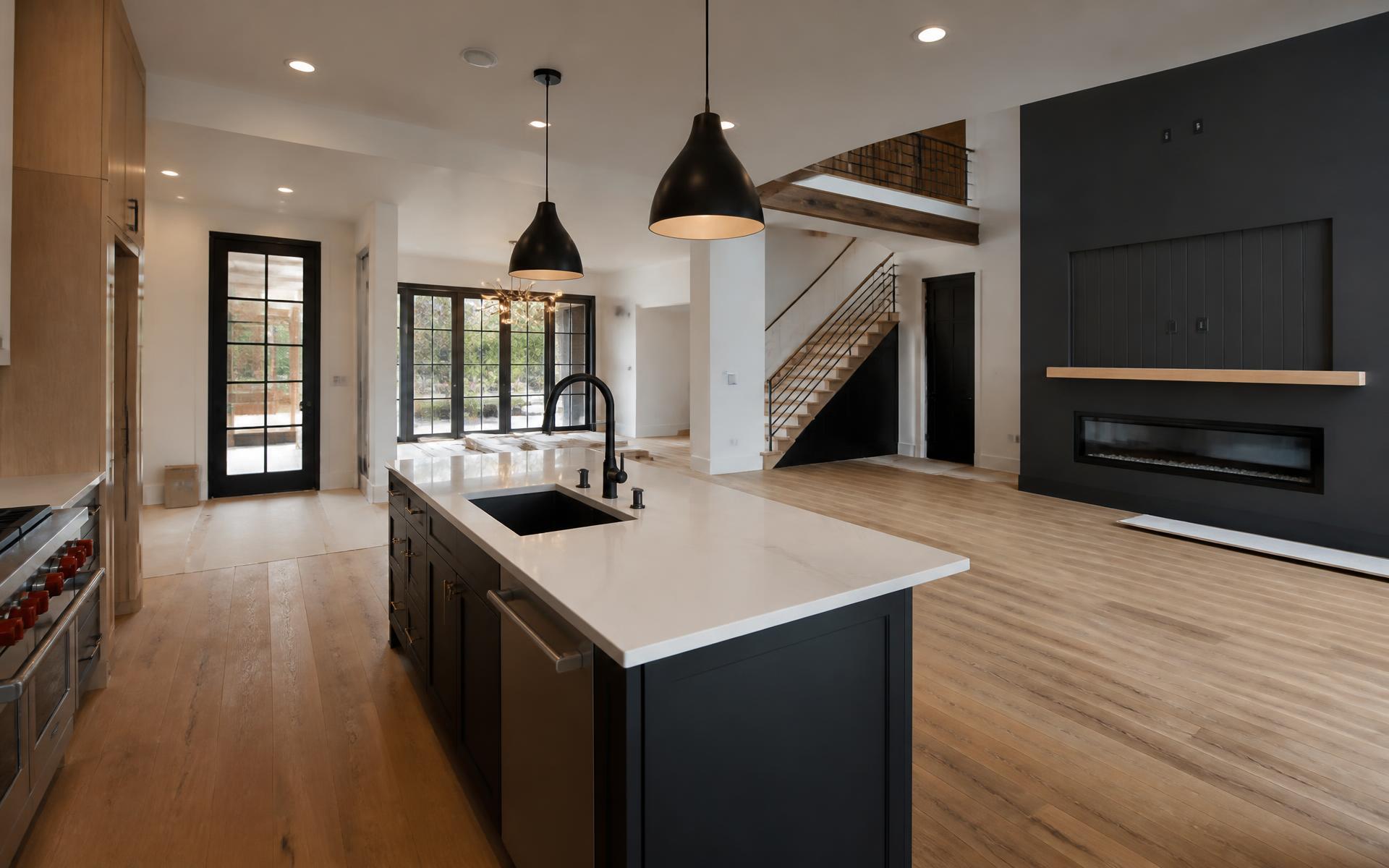 Renovated open-concept home interior with new flooring and finishes
